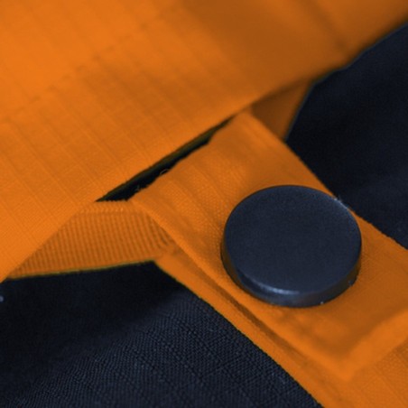 Détail du bouton du gilet haute visibilité orange Singer