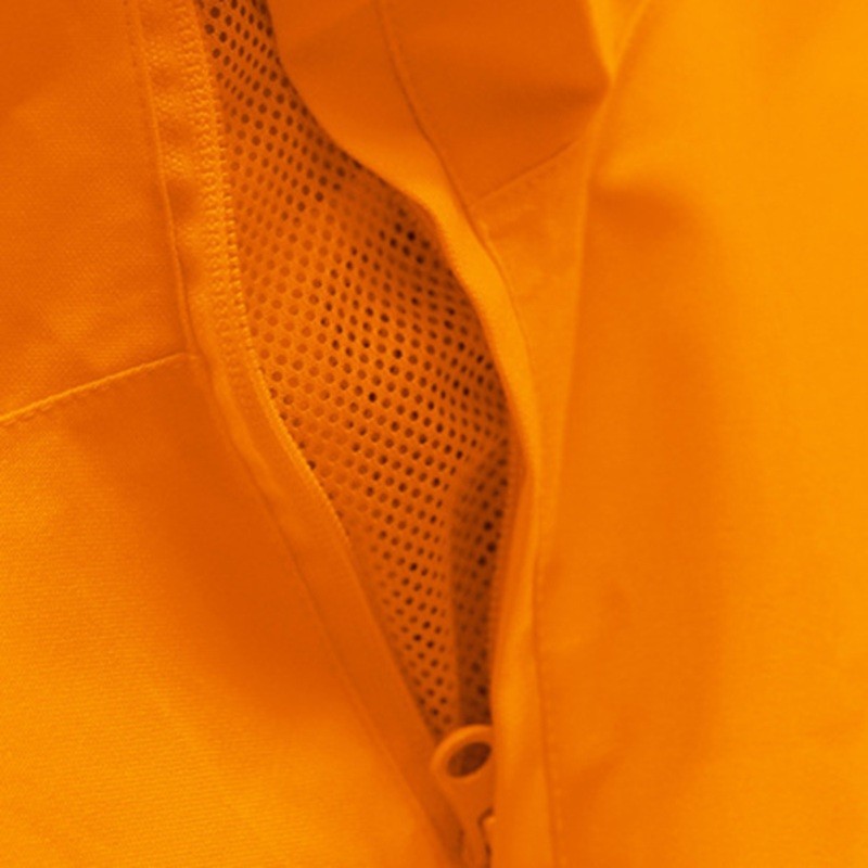 Aération sous les bras de la veste coupe-vent orange VENISO Singer