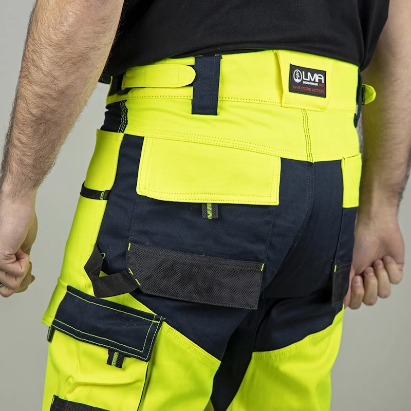 Détail pantalon haute visibilité multipoches LMA renforts arrière et ceinture