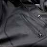 Détail de la poche zippée étanche de la veste de pluie TUNA Nine Worths
